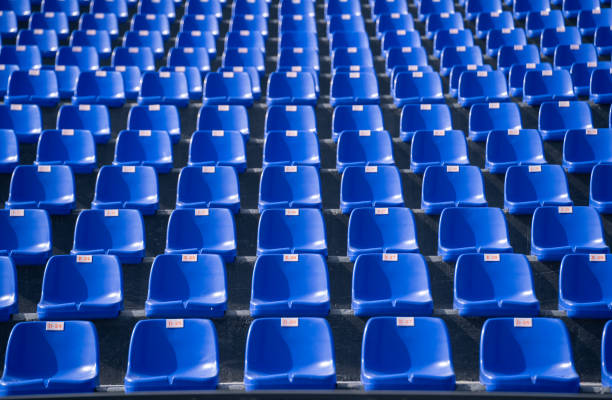 istock Empty blue seats with numbers in the stadium. 2148192650