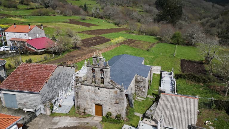 Chapel Virgen de la Victoria in lush Vilar de Barrio, Spain - aerial