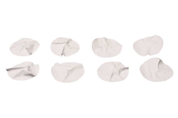 Round white stickers, blank tags labels isolated on a white background. Top view.