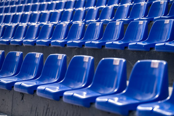 istock Empty blue seats with numbers in the stadium. 2148193655