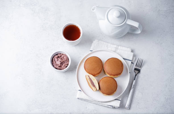 Dorayaki, japanese red bean paste pancakes in a plate. toning