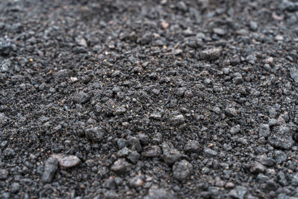 istock Black soil texture background. Black land surface. Farm agriculture field. 2148195408