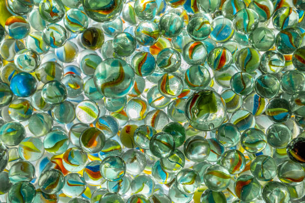 istock tileable of colored marbles or glass stones 2148196015