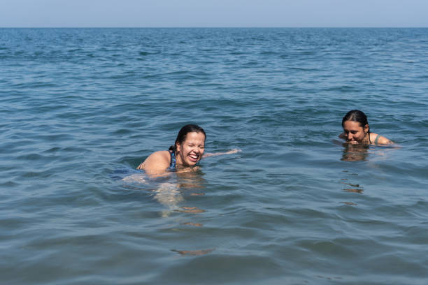istock Joyful Swim in the Ocean 2148197422