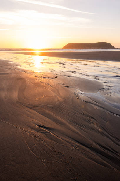 istock A beach with a small island in the distance 2148197900