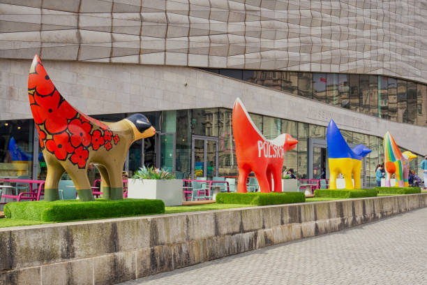 Superlambanana is a bright yellow sculpture in Liverpool 05.04.24 Liverpool, Merseyside, UKThe SuperLambBanana is the work of the Japanese artist Taro Chiezo. Now based in Manhattan, Taro is one of his country's most successful visual artists superlambanana sculpture in liverpool stock pictures, royalty-free photos & images