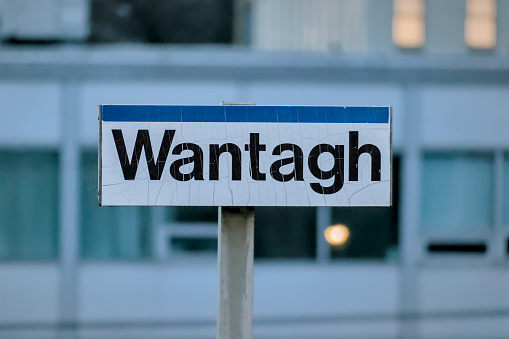 wantagh train station sign on plaform of railroad (long island town with jones beach destination)