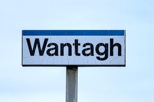 wantagh train station sign on plaform of railroad (long island town with jones beach destination)