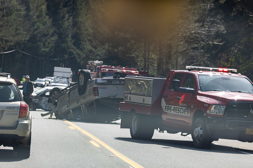 Brookings, Oregon/USA- March 21: Rescue teams go out to assist a car crash on highway 101 on March 21 2021.