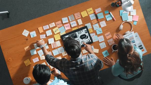 istock Top view of creative designer working together brainstorming idea. Symposium. 2148208632