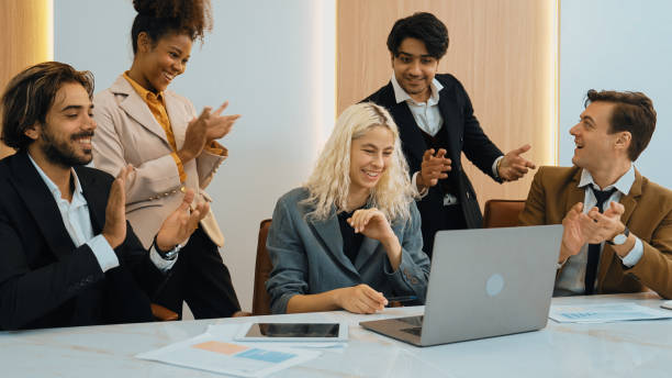 istock Diverse group of office worker and employee applauding in ornamented office. 2148208767