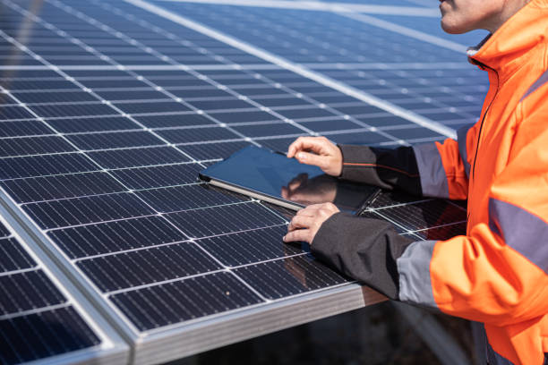 istock Female Engineer in Solar Power Plant. Solar City. 2148210144