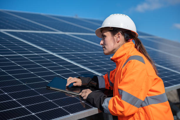 istock Ai in Solar Energy. Female Engineer in Solar Power Plant. 2148210149