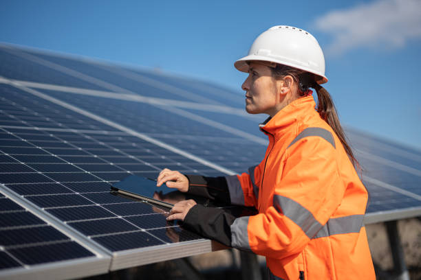 istock Solar Innovations. Female Engineer Using AI in Solar Power Plant. 2148210151