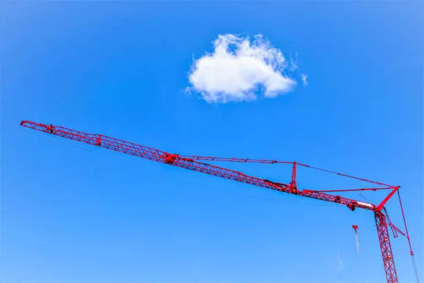 Large static red tower crane