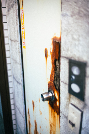 Doorknob of a dilapidated apartment