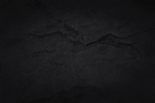 istock Dark grey black slate texture in natural pattern with high resolution for background and design art work. Black stone wall. 2148214477