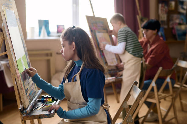 istock Children with Disabilities Enjoying Art Therapy 2148215014