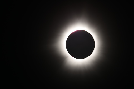 A perfect totality of solar eclipse with corona flares