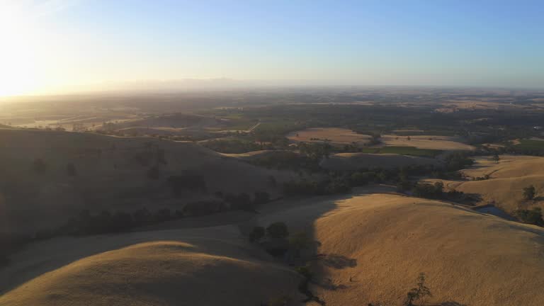 Aerial drone view at sunset of Steingarten lookout in South Australia.
Steingarten lookout, located in the Barossa Valley,  is the perfect spot for a picnic and a well-deserved glass of wine at sunset