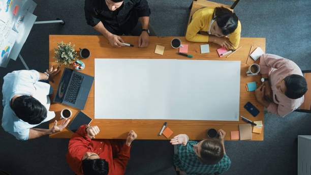 istock Top view of group walking at boardroom and brainstorming idea. Convocation. 2148218521