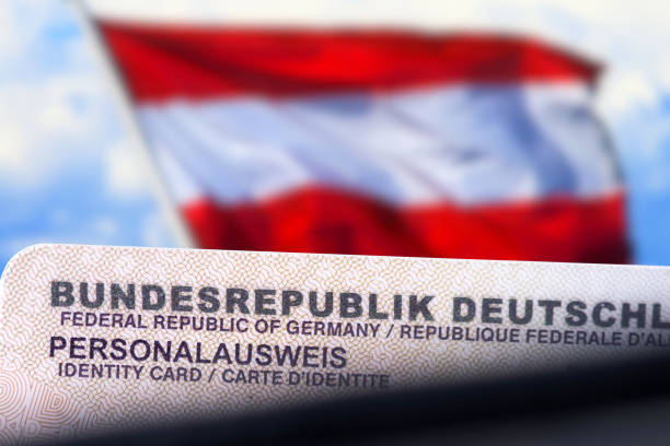 istock A German identity card and flag of Austria 2148218848
