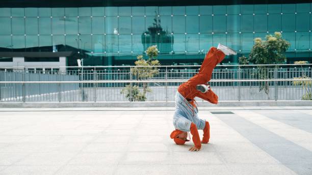 istock Skilled dancer moving energetic footstep while perform street dance. Sprightly. 2148219239