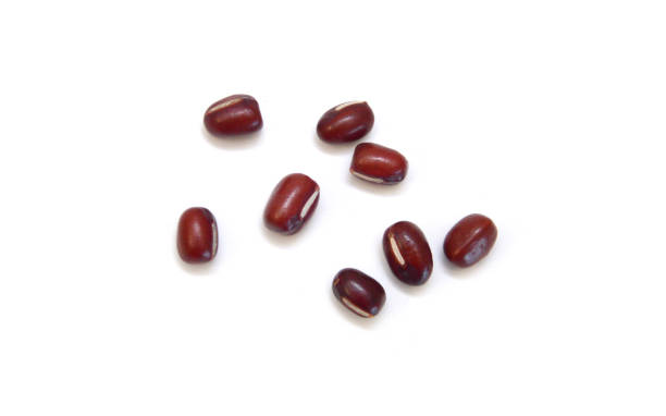 istock Adzuki beans pouring on white background 2148219813