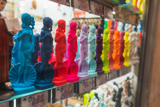 Colorful and cute statue souvenirs sold on the streets of Italy.