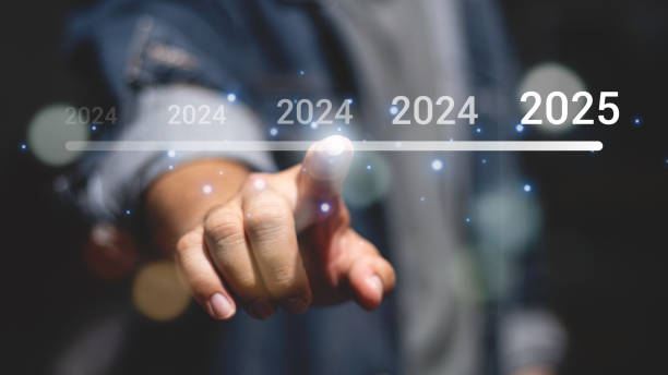 istock Businessman touching to virtual start button icon with 2025 for start merry Christmas and happy new year concept. 2148221384