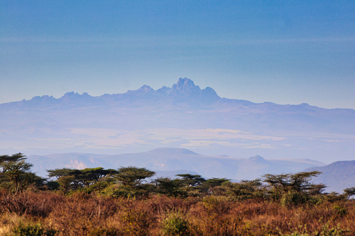 Mount Kenya, thehighest mountain in Kenya at 5199 meters dominates the horizon as seen over the vast samburu region at the Buffalo Springs Reserve in Kenya