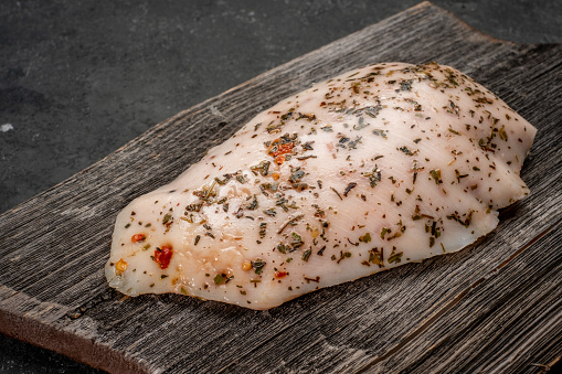 sous vide chicken breast prepared for grilling with seasonings