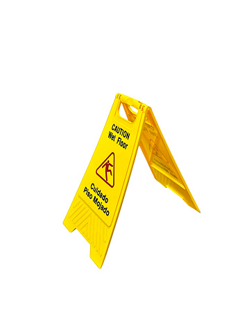 Wet floor warning sign with clipping path on white background