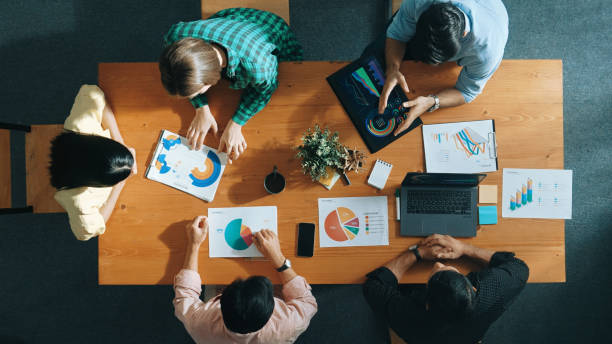 istock Top view of manager use tablet to analyze data and financial chart. Convocation. 2148224111