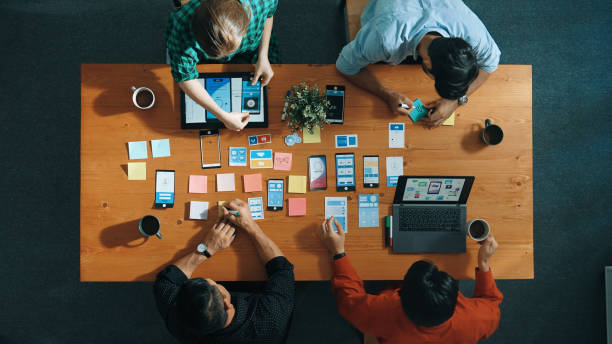 istock Top view of developer and designer shake hand together at meeting. Convocation. 2148224771