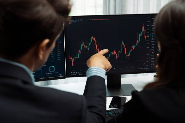 istock Business traders discussing on dynamic stock risk or profit point. Postulate. 2148227174