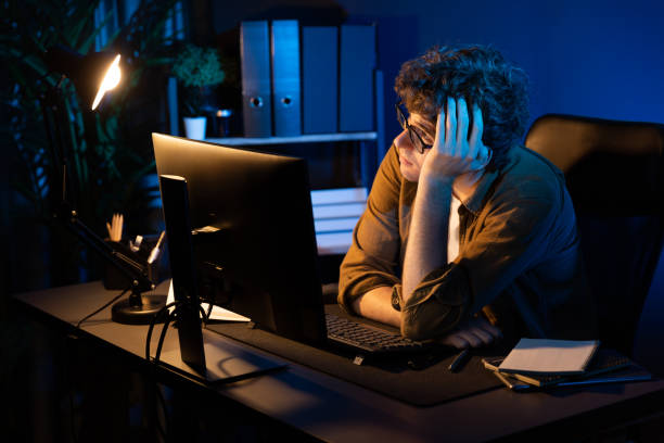 istock Stressful creative manager searching design presentation at night time. Gusher. 2148231736