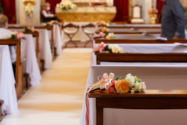 istock church aisle elegantly adorned with floral arrangements for a wedding 2148231945