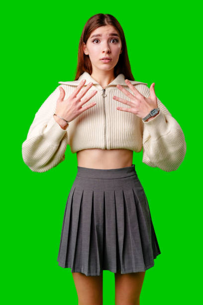 istock A woman wearing a white sweater is gesturing with her hand, possibly expressing emotion or emphasizing a point. 2148232310