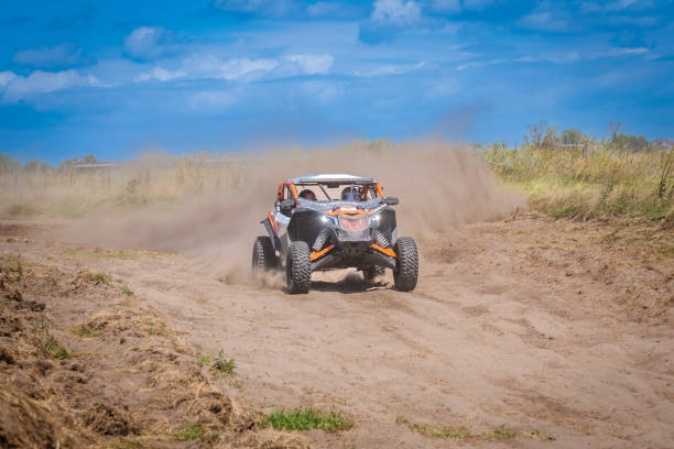 istock UTV in action offroad vehicle racing on sand dune. Extreme, adrenalin. 4x4. 2148233123