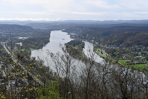 Remagen, Germany, March 31, 2024 - Rhine valley with the island of Nonnenwerth and river seen from Drachenfels near Bonn.