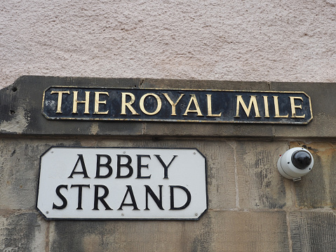 The Royal Mile and Abbey Strand street sign in Edinburgh, UK