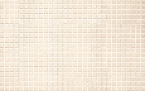istock Cream light ceramic wall chequered and floor tiles mosaic background in bathroom, kitchen. Design pattern geometric with grid wallpaper texture decoration pool. Simple seamless abstract surface clean. 2148233515
