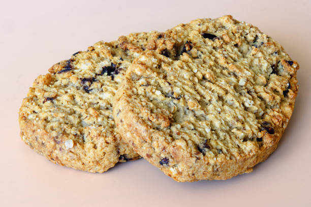 istock two soft flaky cookies on an orange background 2148234389
