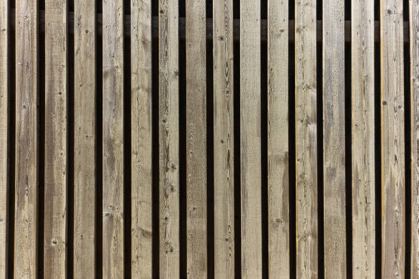 istock Wooden background from old gray boards close up 2148234601