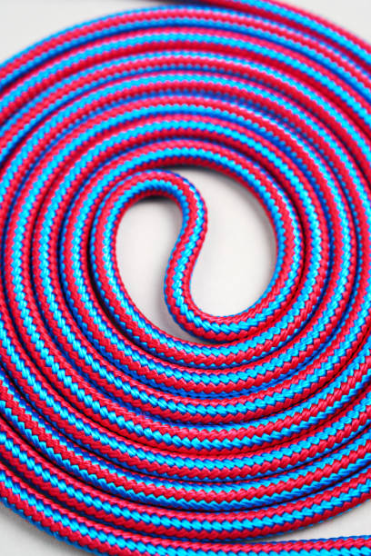 istock Colorful rope coil on a white background. Colorful rope twisted, close-up 2148236521
