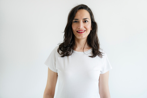 Smiling woman in white t-shirt, portrait
