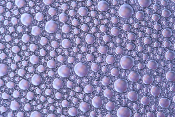 Abstract lilac macro background with lots of soap bubbles