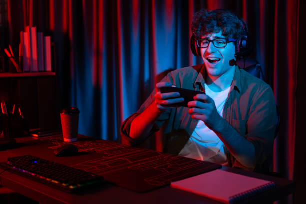 istock Stressful streamer team playing with Esport on phone with harder game. Gusher. 2148239251