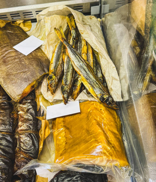 istock Smoked fish on a counter in a market 2148239797